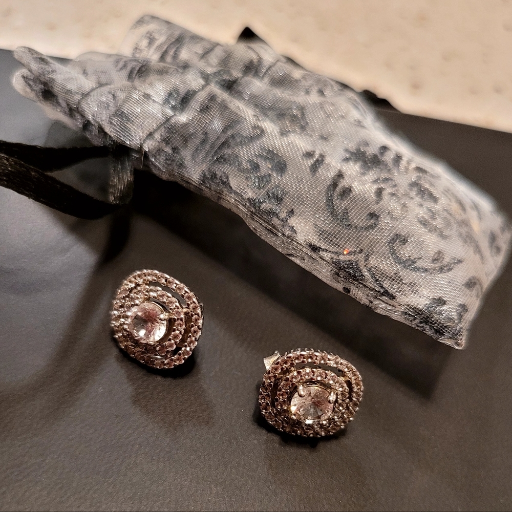 Sterling Silver stud cz earrings.